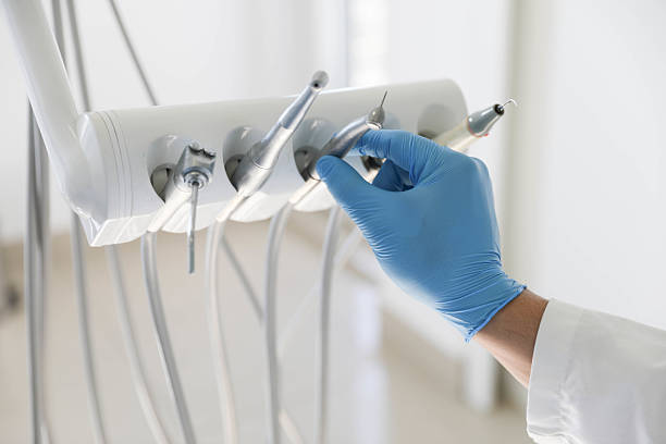 Professional Tooth Extraction technician working in Grand Prairie, TX